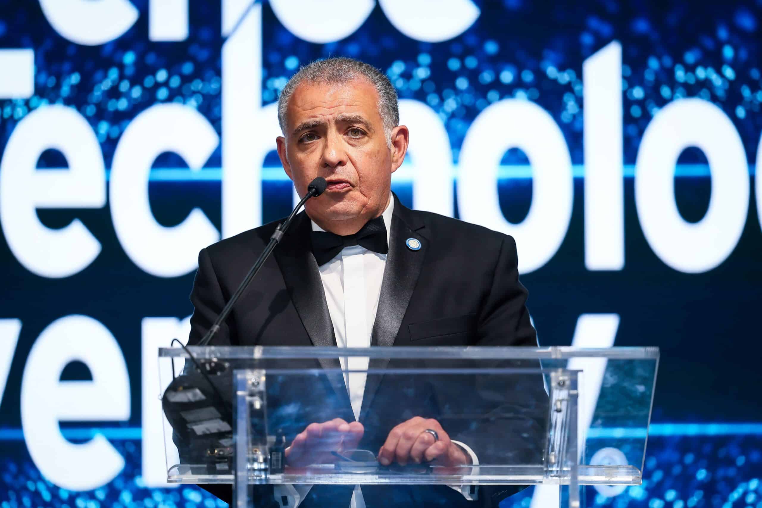 Tarek M. Sobh, Ph.D., P.E., speaking at an education event on technology and innovation.