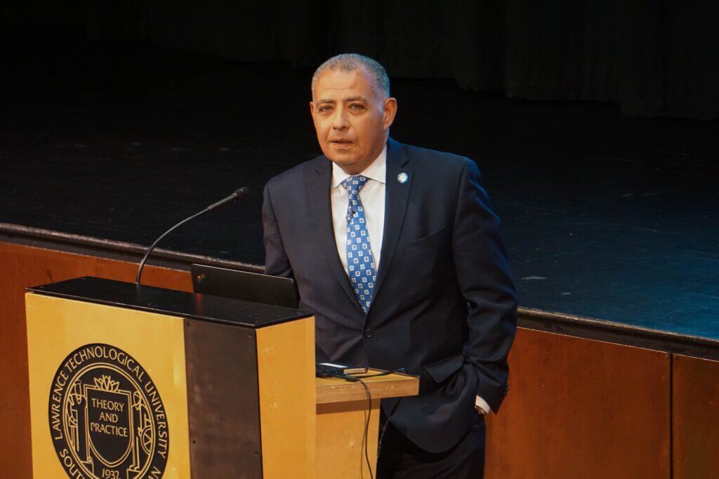 Professor Tarek M. Sobh, Ph.D., P.E., delivering a speech at a professional engagement.
